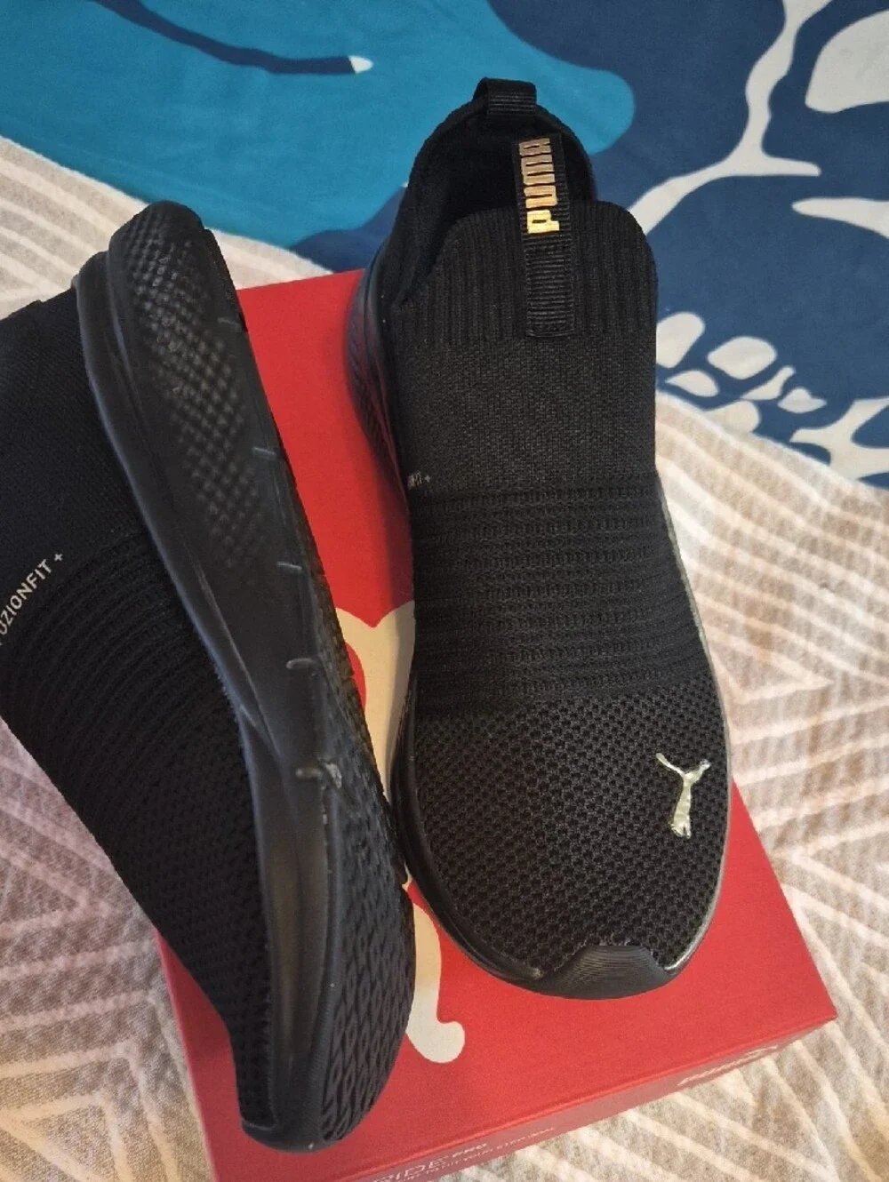 Puma Men’s Black Slip-On Knit Sneakers with Gold Trim